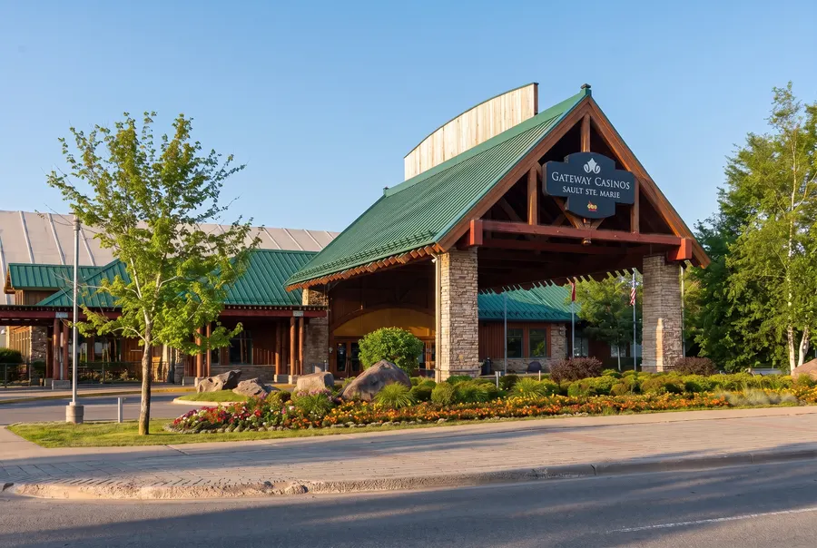 Lodge-style casino portico on Bay Street in summer